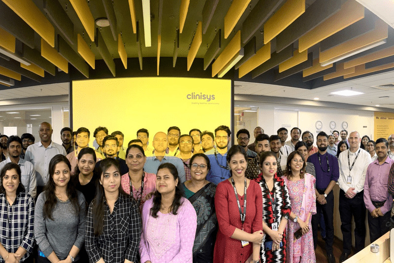 Clinisys colleagues gathered in a modern office