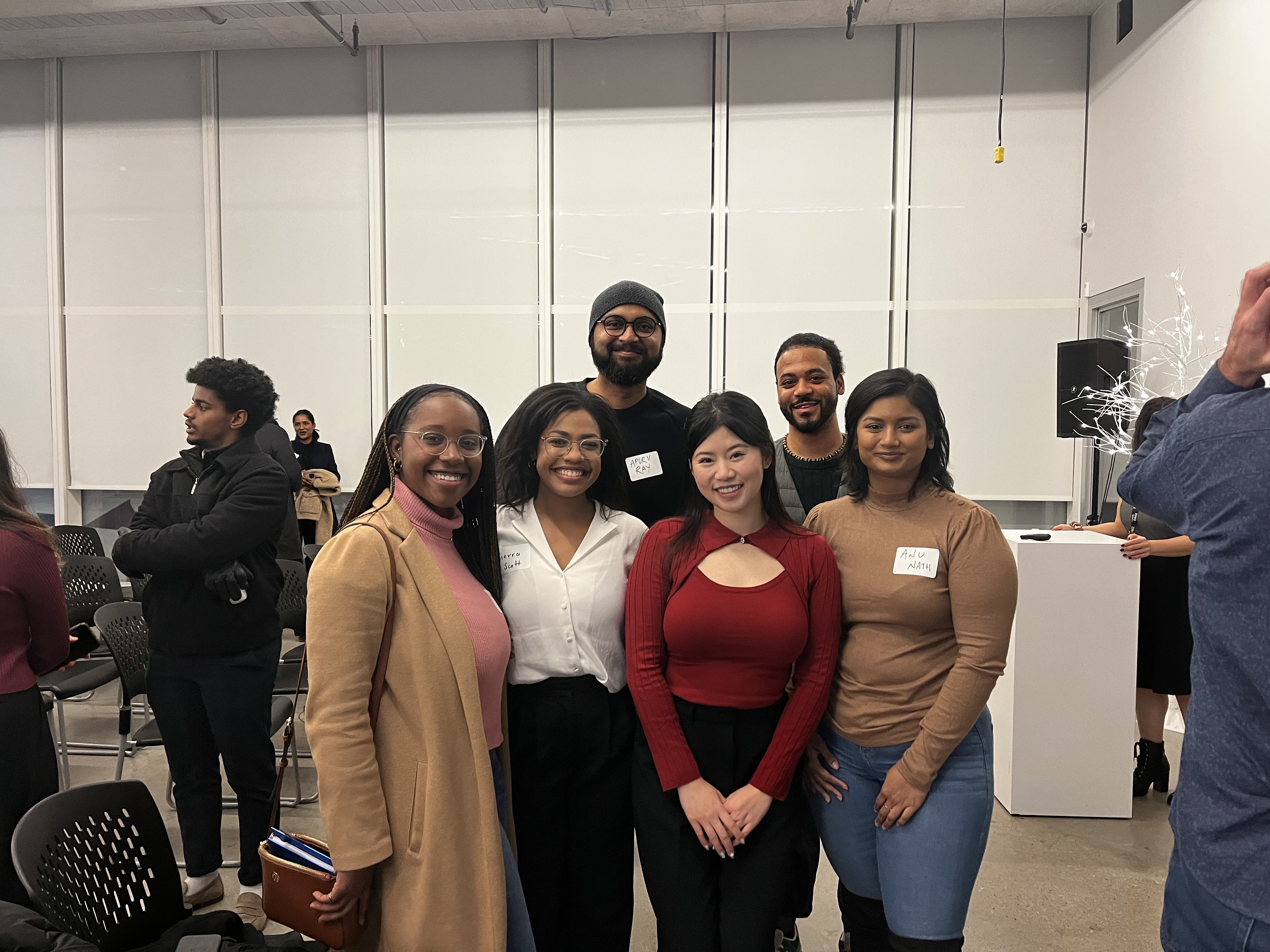 Helen Huang in red with Diverse Tech Talent Program learners in Toronto