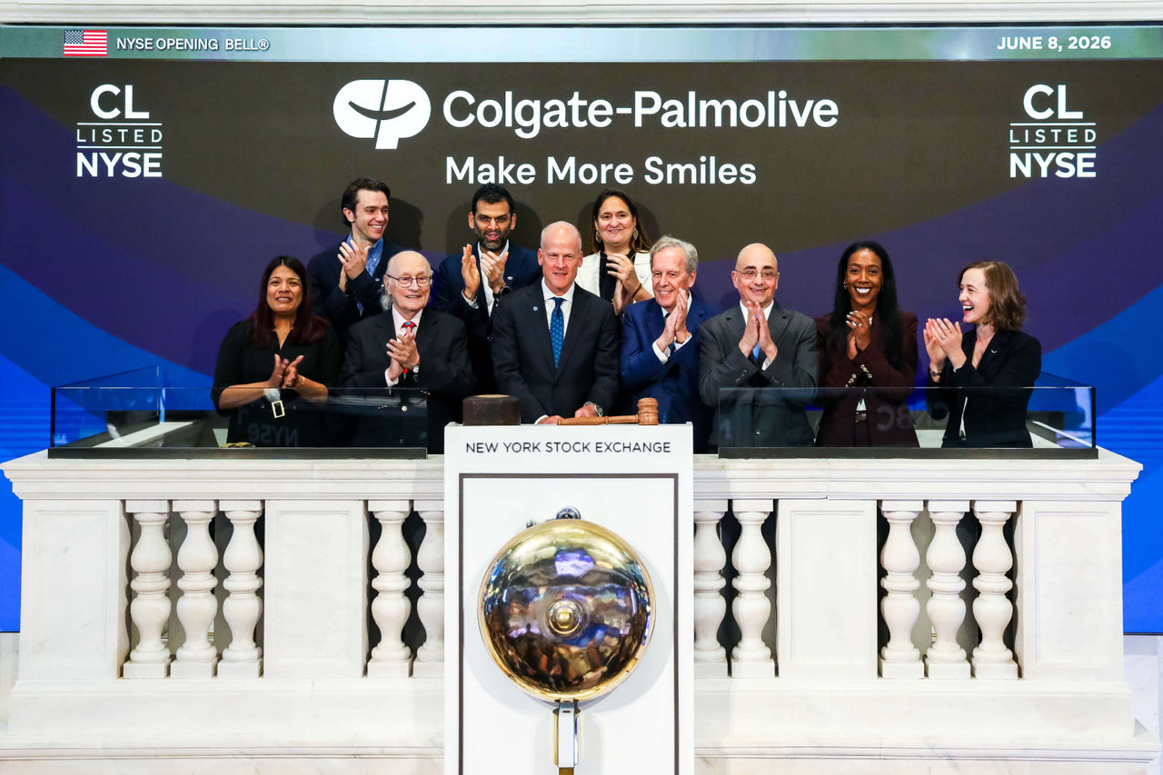 Noel Wallace and Colgate-Palmolive executives at the New York Stock Exchange