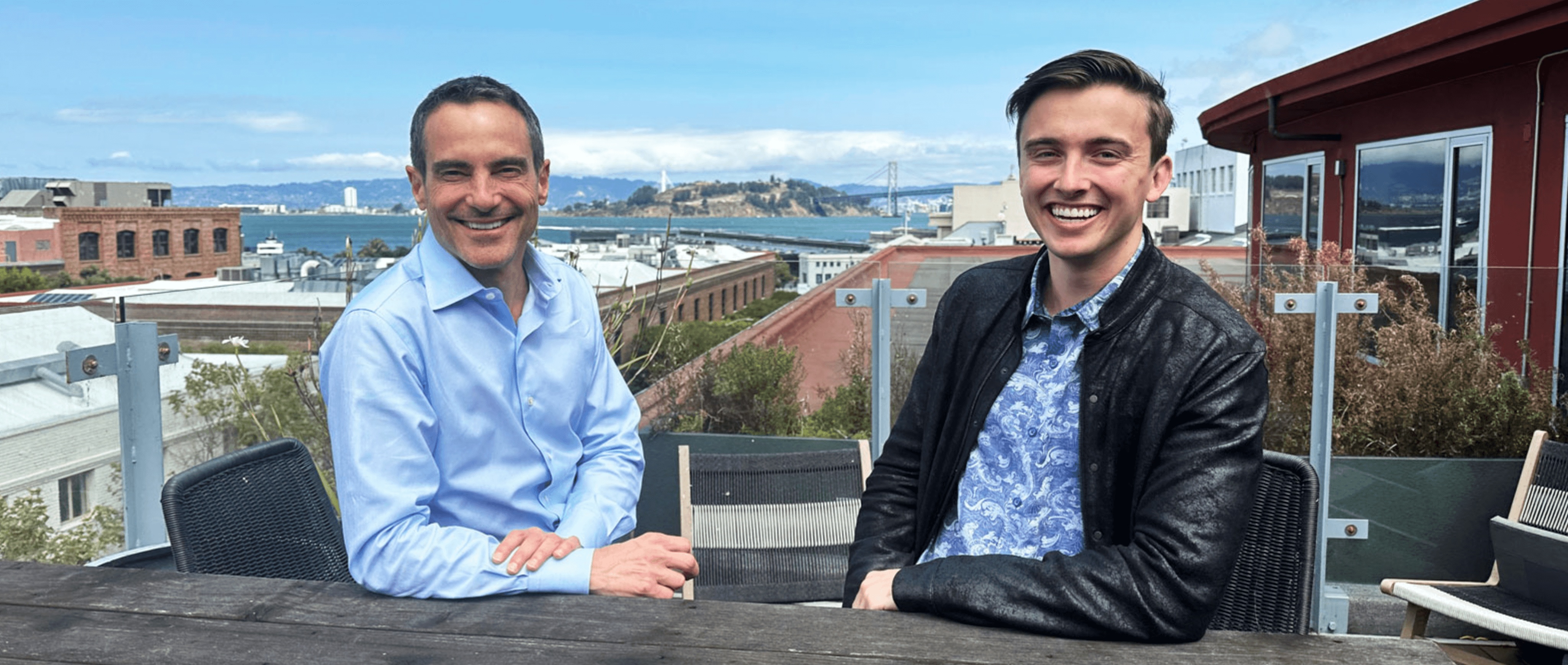 Colin Wiel, left, and Qurrent co-founder August Rosedale seated together outdoors