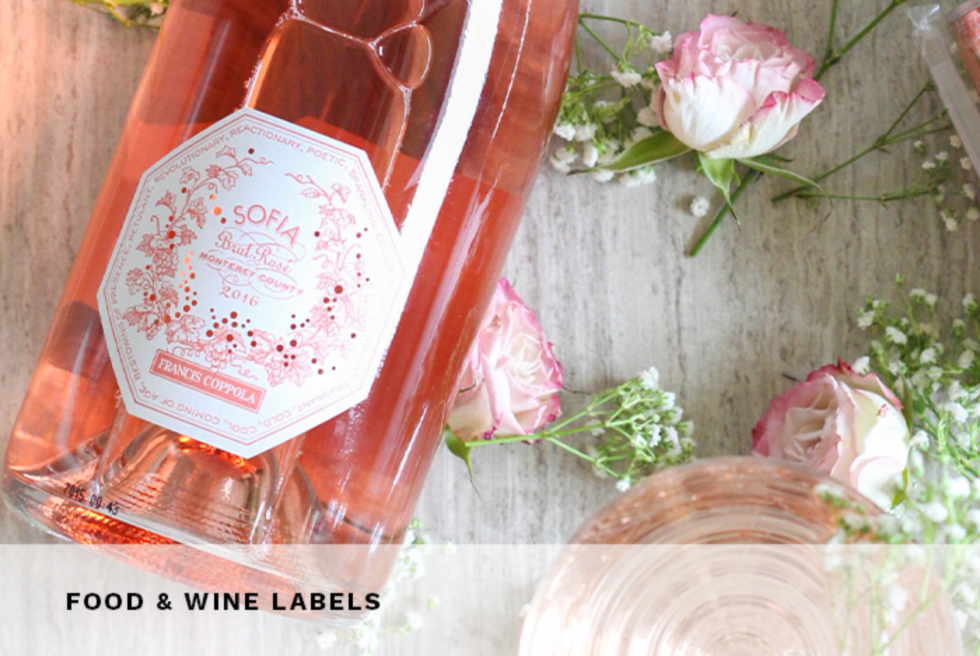 Sofia rosé bottle and flowers in COLORZONE’s food and wine label service image
