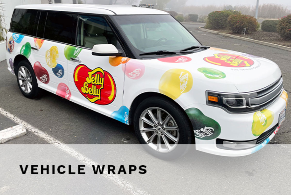 White vehicle covered with colorful Jelly Belly graphics in COLORZONE’s vehicle-wrap portfolio