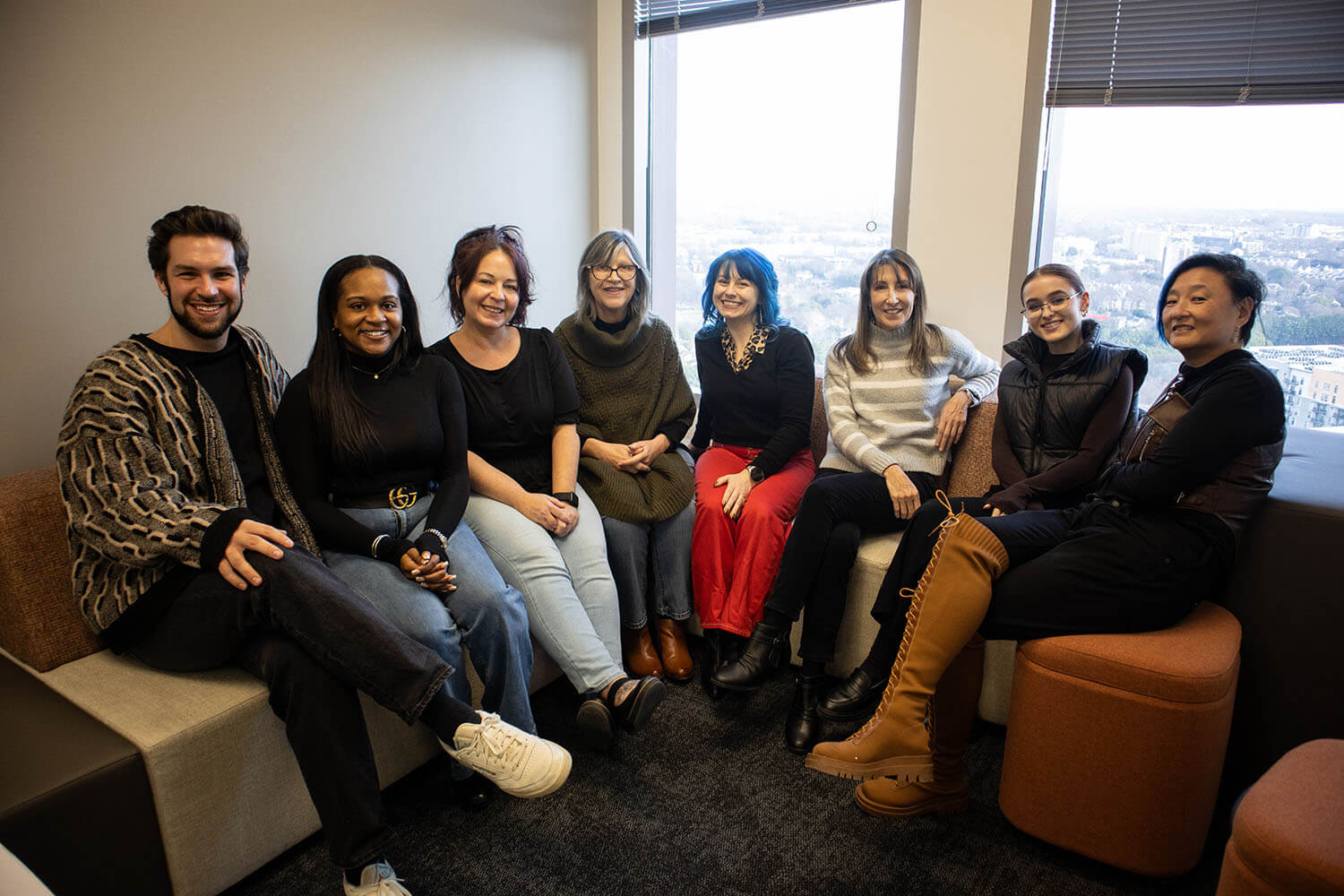 The communications 21 team together in their Atlanta office