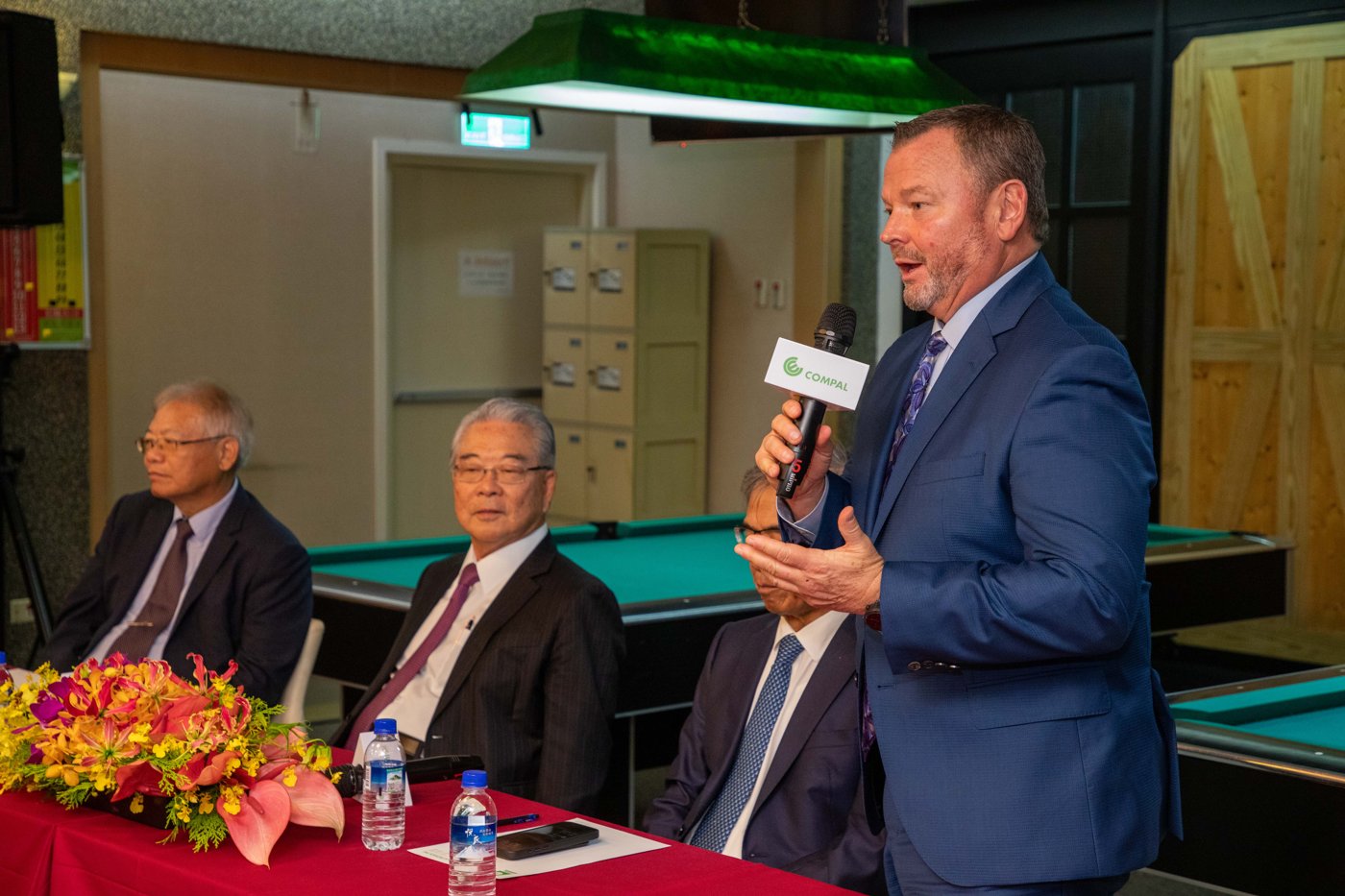 Compal President Anthony Peter Bonadero speaking at a company event