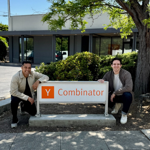 BitBoard co-founders Ambar Choudhury and Connor Jones beside the Y Combinator sign