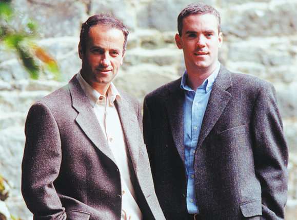 An archival photograph of brothers Paul and Conor Murphy outdoors