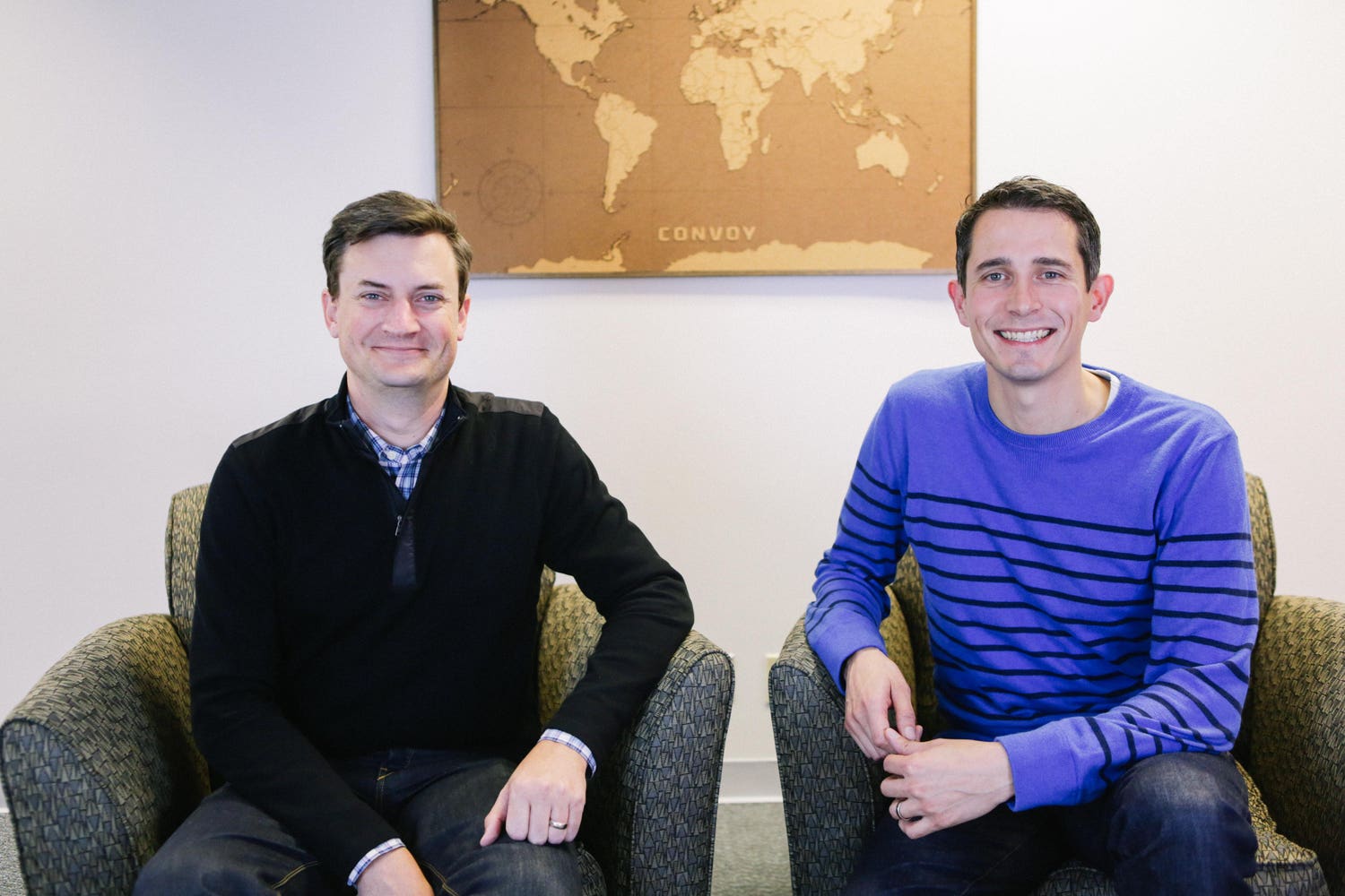 Convoy co-founders Grant Goodale and Dan Lewis seated in their office