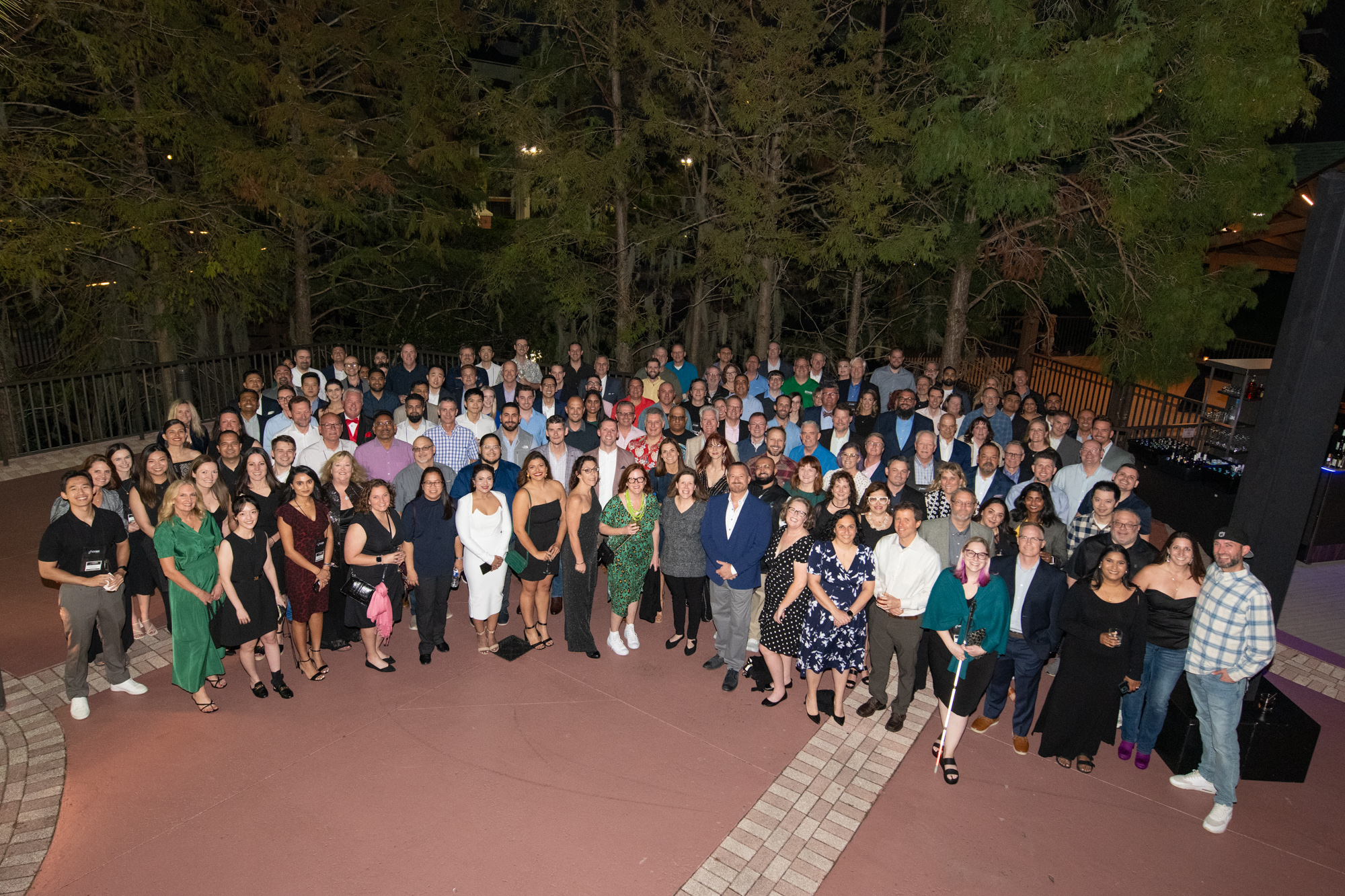 CORA University participants gathered outdoors for a group photograph