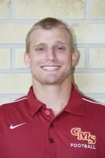 Corbin Tognoni in a red CMS football polo in his 2011 roster photograph
