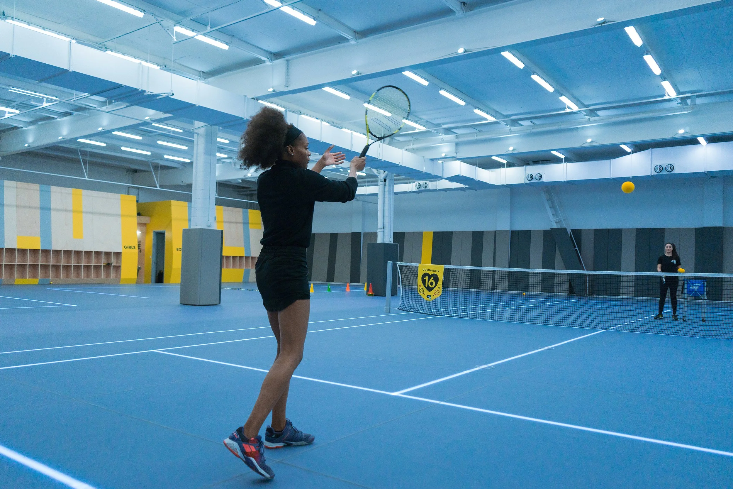 A player practicing a forehand at Court 16’s Long Island City club