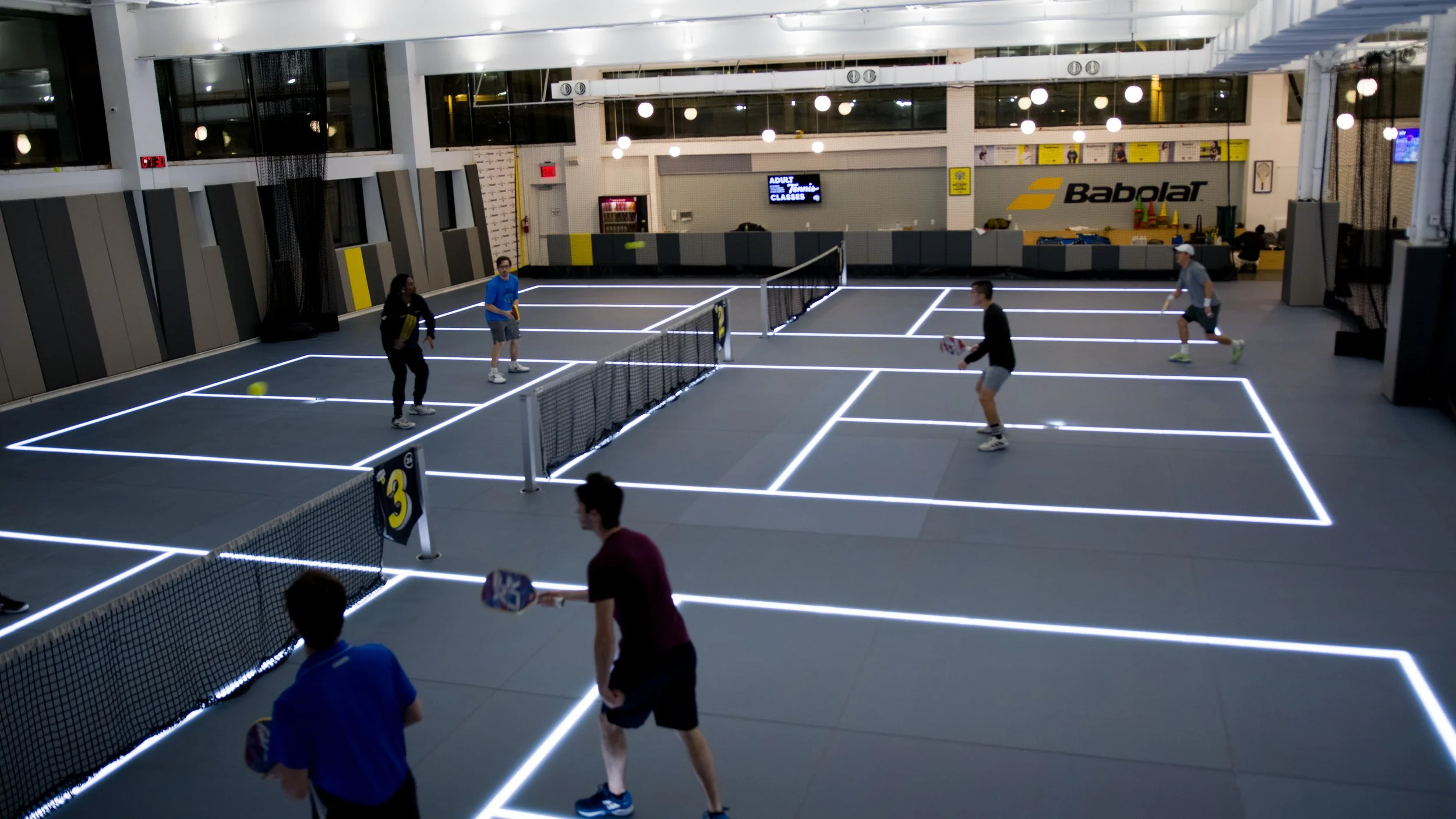 Adults playing pickleball at Court 16 in Long Island City