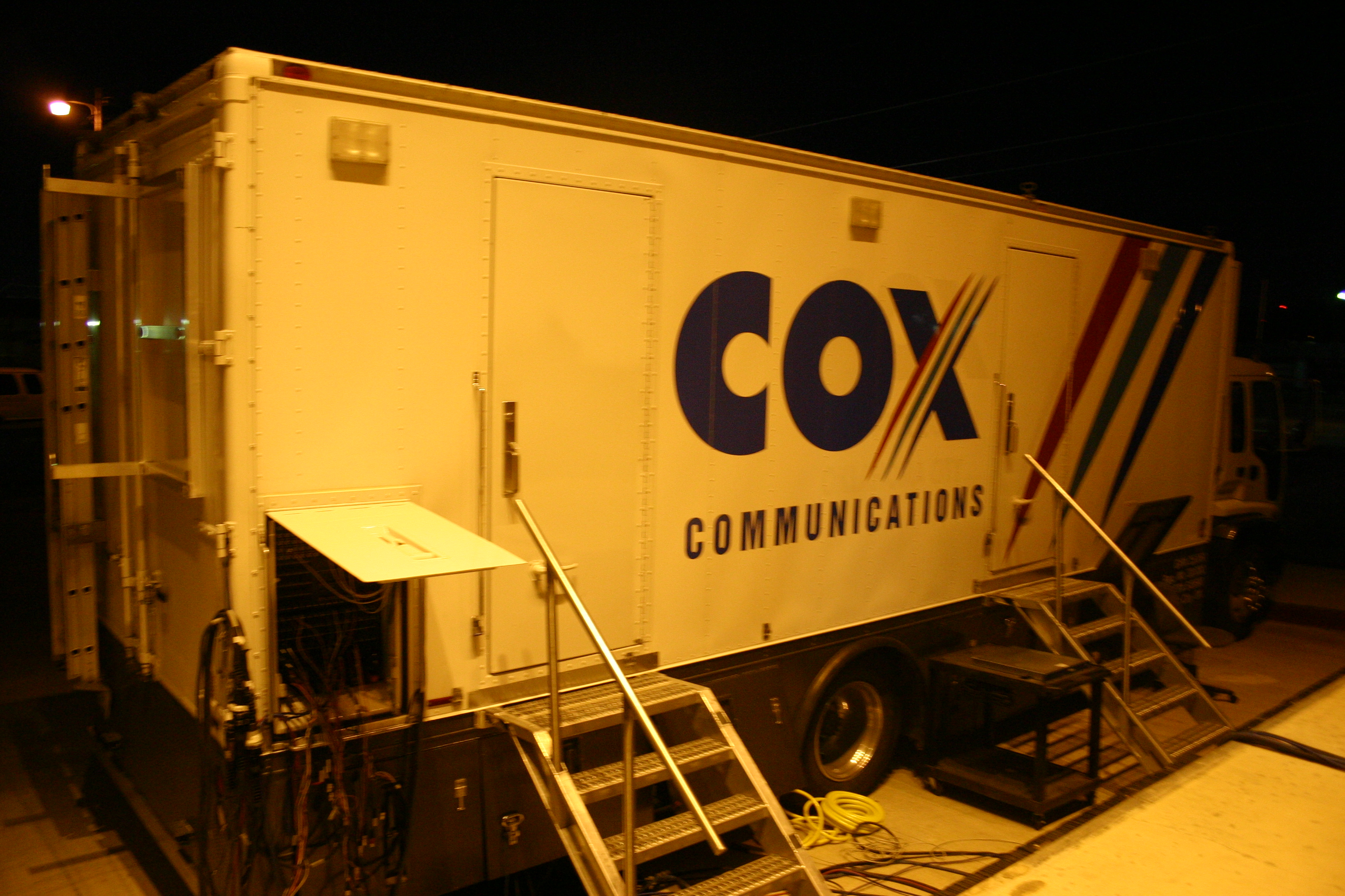 A Cox Communications branded trailer at a community event
