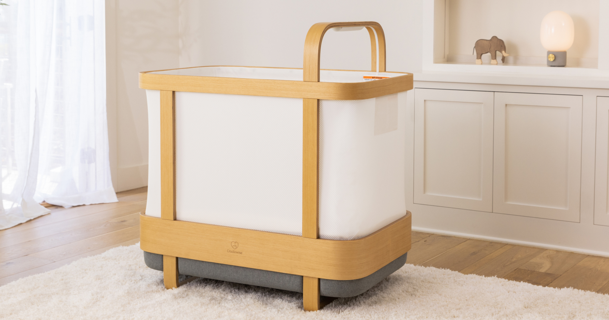 Cradlewise smart crib in a nursery