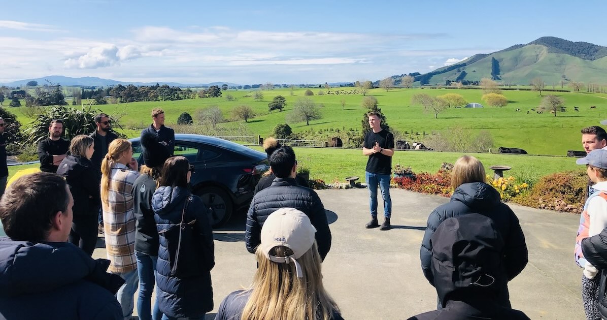 Craig Piggott addressing a group during a farm visit in the Waikato