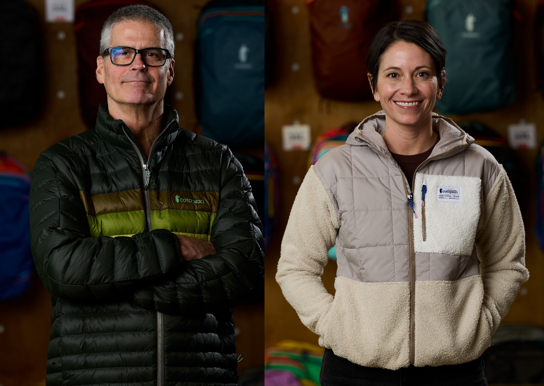 Craig Rowley and Sara Westbrook wearing Cotopaxi jackets in front of colorful backpacks