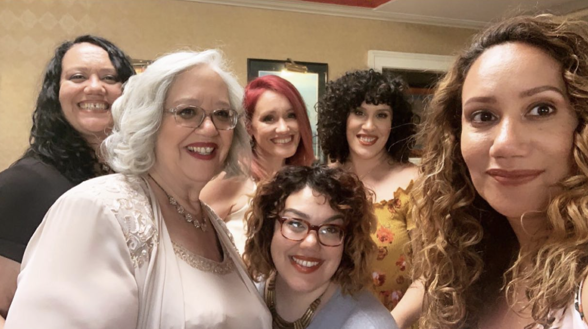 Cristina Vera Bridges pictured with her mother and four sisters