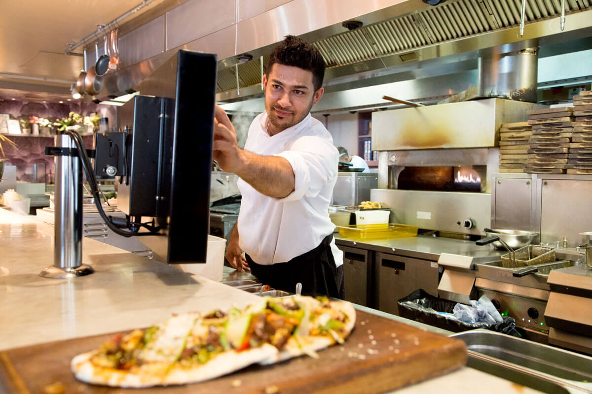 Crunchtime kitchen display equipment in a restaurant kitchen