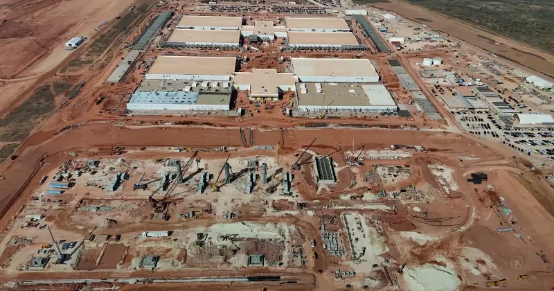 Aerial view of buildings and construction work at Crusoe’s Abilene data center campus