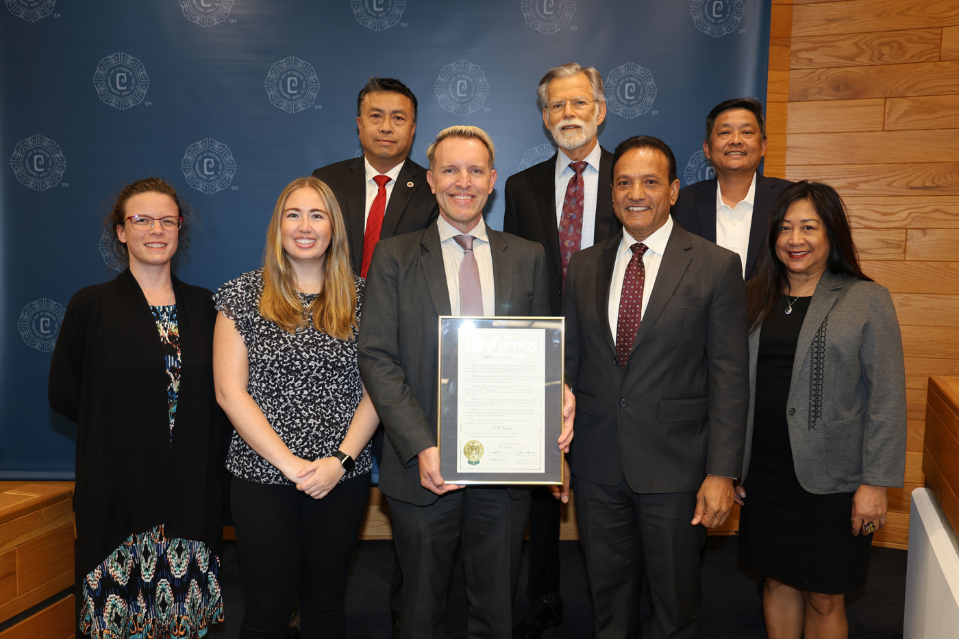 CTA Travel representatives receiving a City of Cerritos proclamation in the council chamber