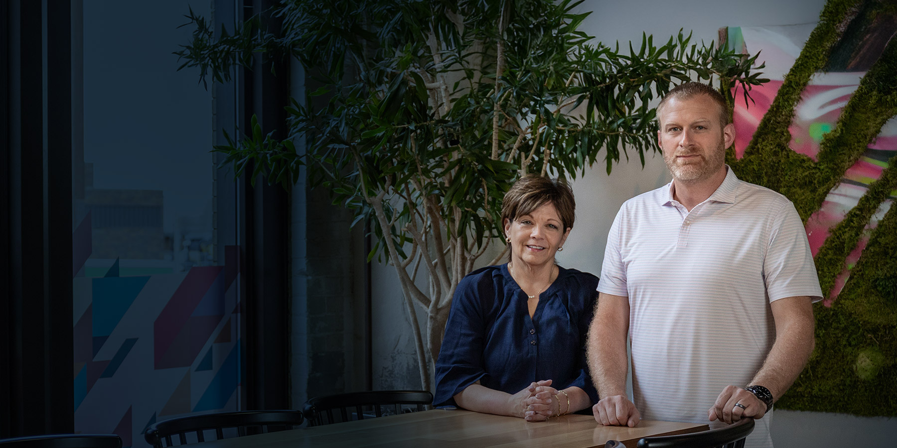 Laurie Fleck and Mitch Van Kampen in the Curious Plot office