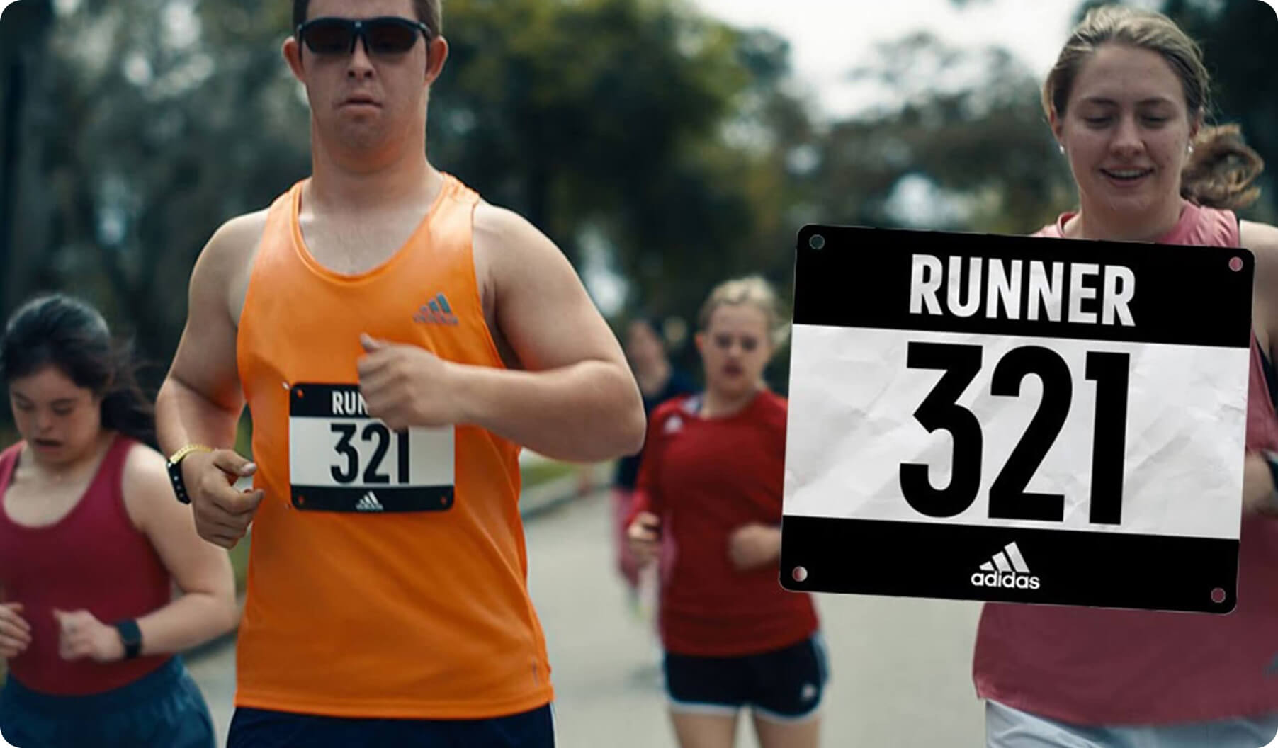 Runner 321 campaign featuring a marathon runner with bib number 321