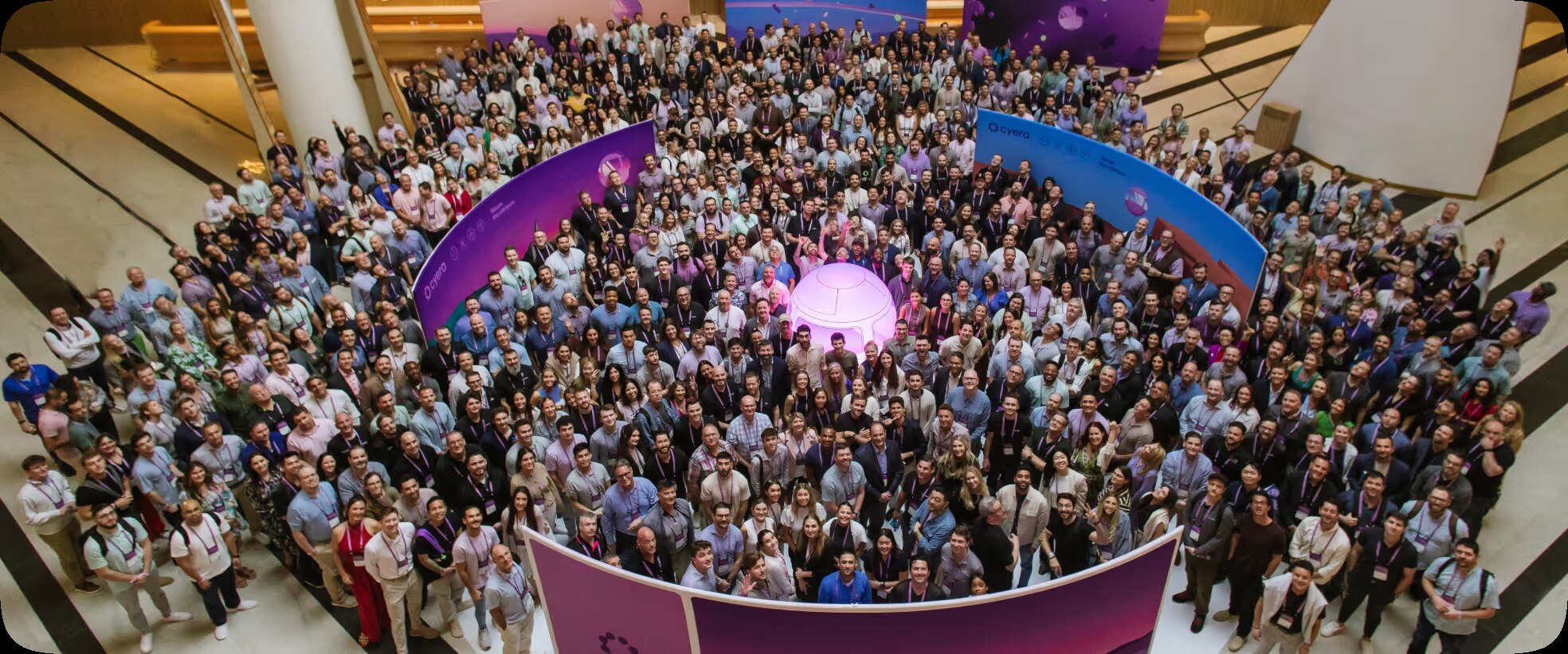 Cyera employees gathered together in a company team photograph