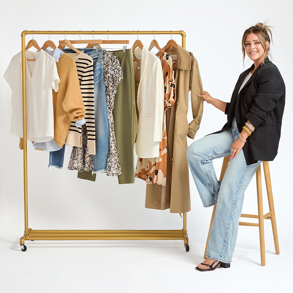 DAILYLOOK stylist Diane beside a rack of coordinated clothing
