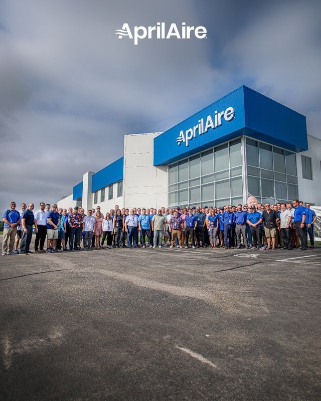 AprilAire team members gathered outside the Sun Prairie Innovation Center for their annual sales meeting