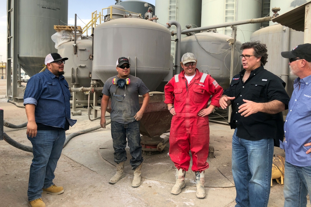 Dale Redman speaking with workers at ProPetro’s equipment yard in Midland, Texas