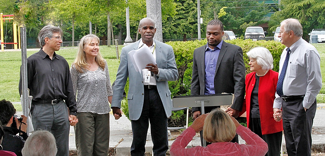 Dan and Cindy Brettler join Gordon McHenry Jr., resident Keith Sterling and public officials at the Sand Point Housing Campus dedication