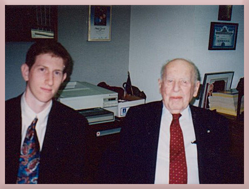 A young Dan Engel seated beside investor Philip Carret