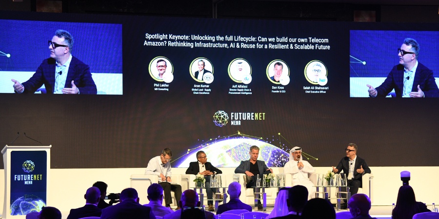 Dan Knox seated at the centre of a five-person FutureNet MENA panel discussing telecom equipment reuse