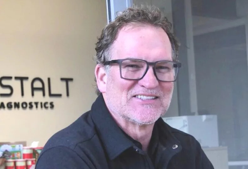 Dan Roark, CEO of Gestalt Diagnostics, smiling for a press portrait