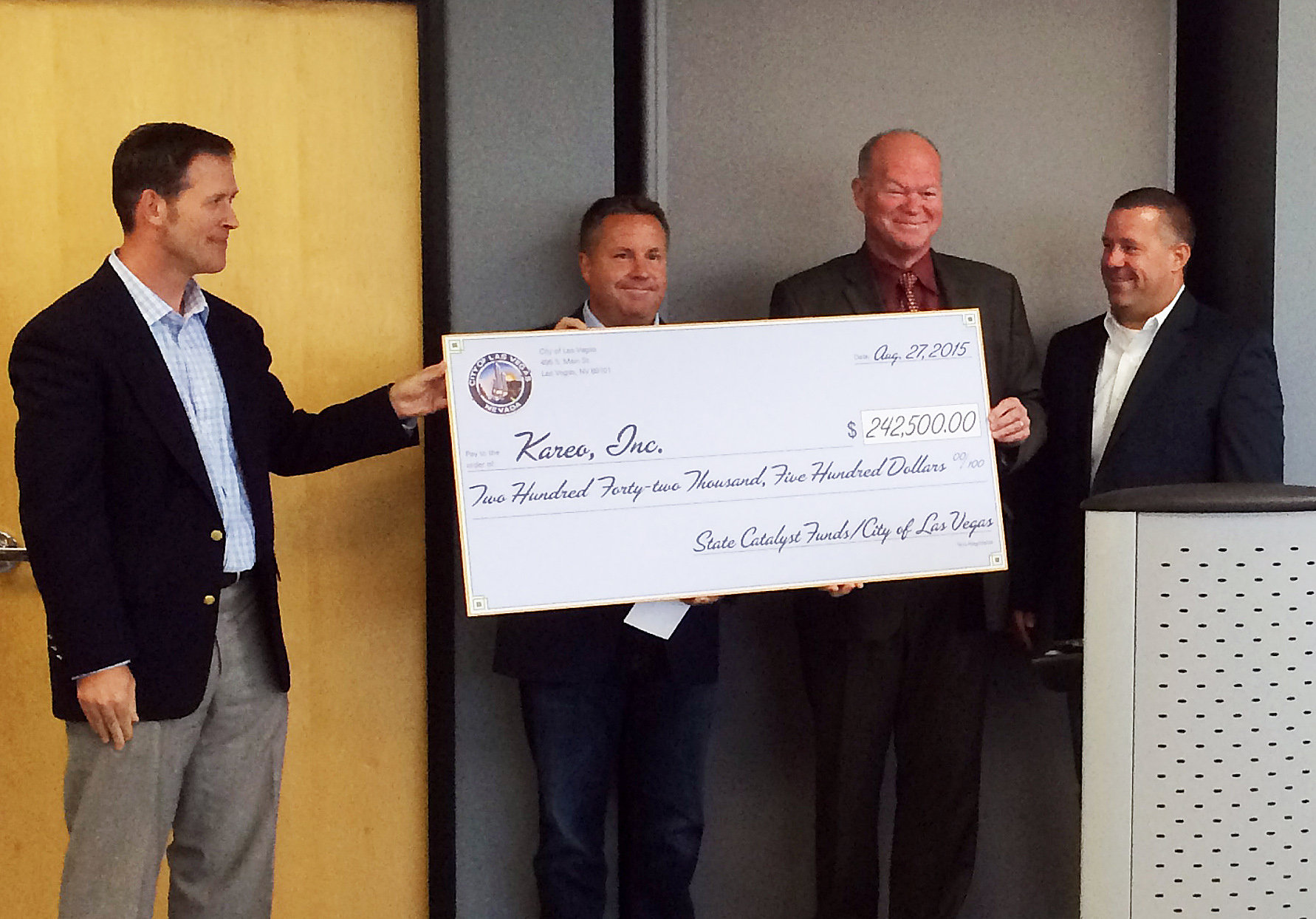 Dan Rodrigues, second from left, with Bill Arent, Bob Beers and Tom Patterson at Kareo’s Las Vegas office in 2015