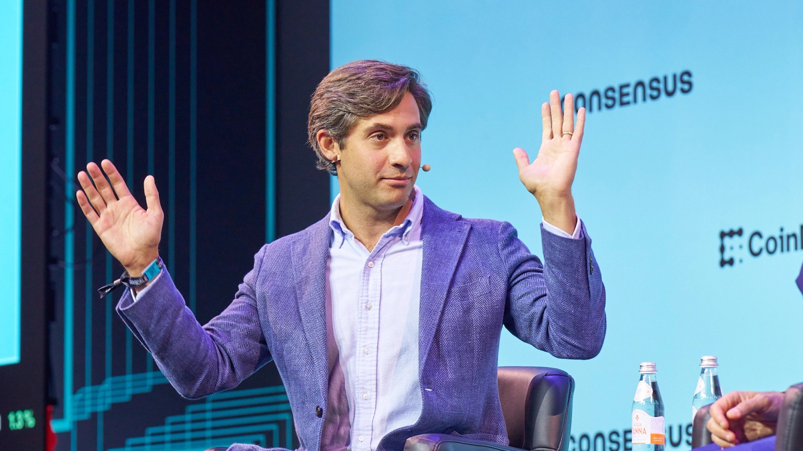 Dan Romero speaking onstage at Consensus 2026 in Miami