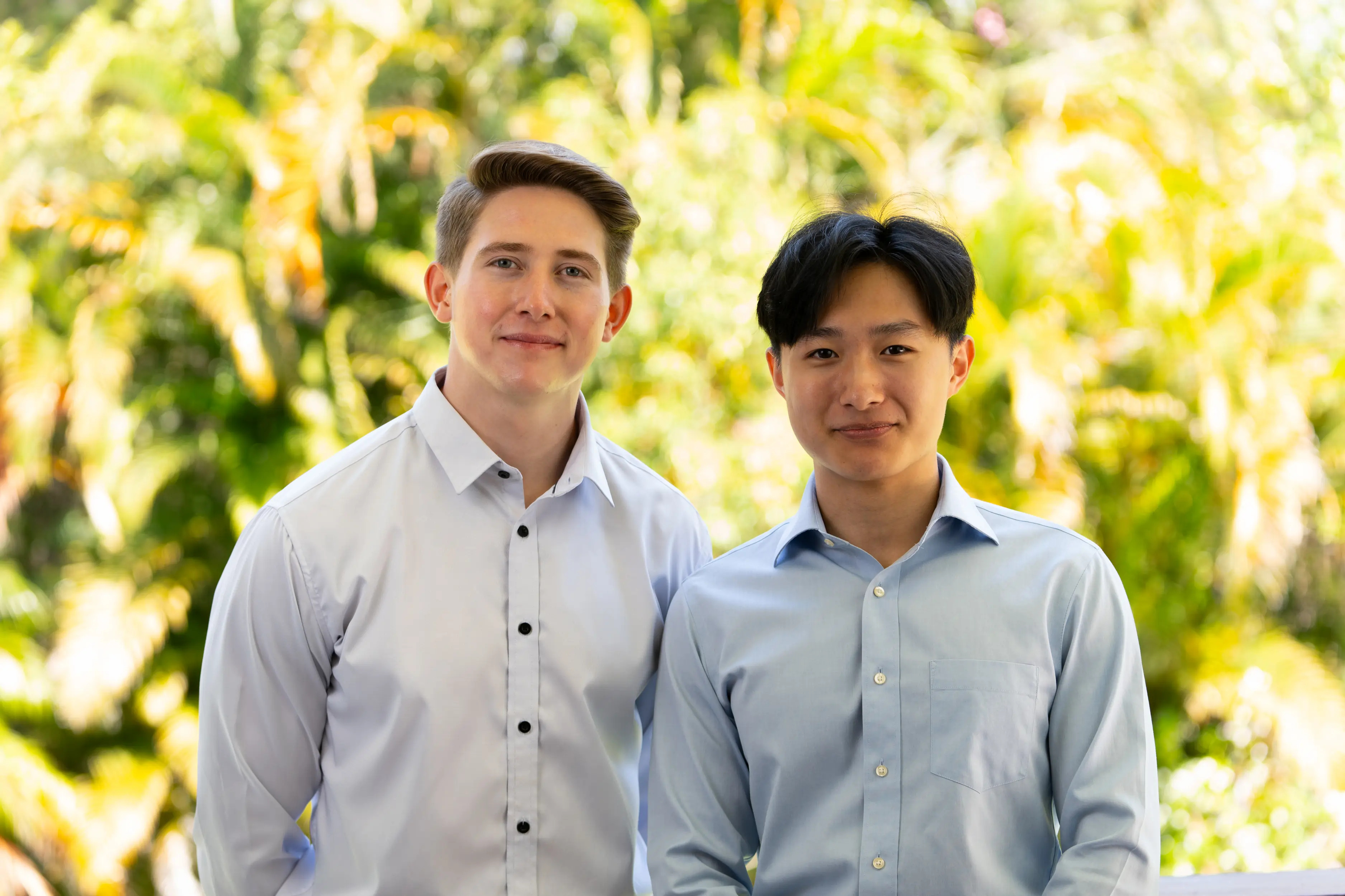 Edexia co-founders Daniel Gibbon and Nathan Wang standing together outdoors