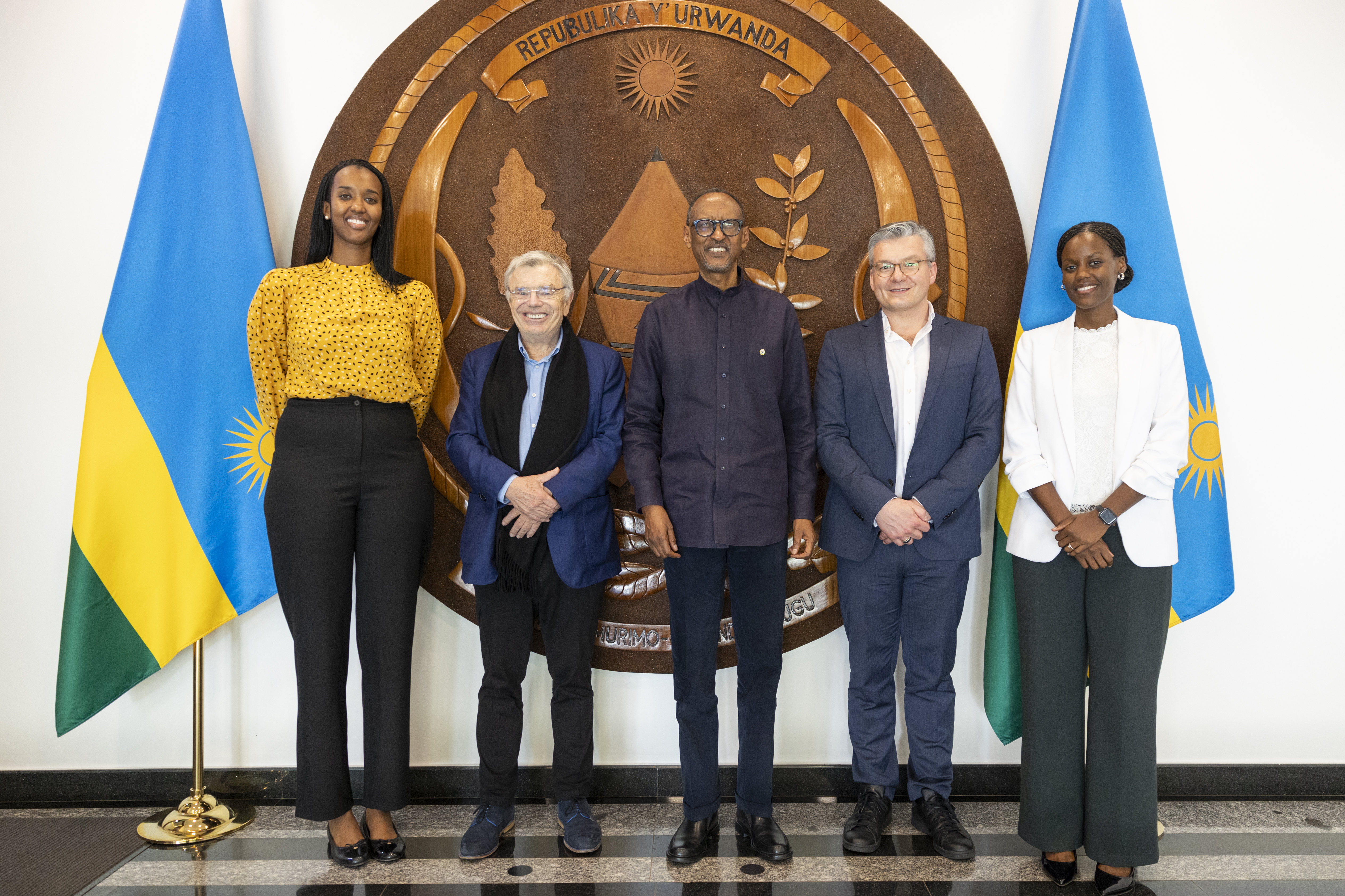 Daniel Julien, second from left, with Paul Kagame, Thomas Mackenbrock and other participants at a meeting in Kigali.