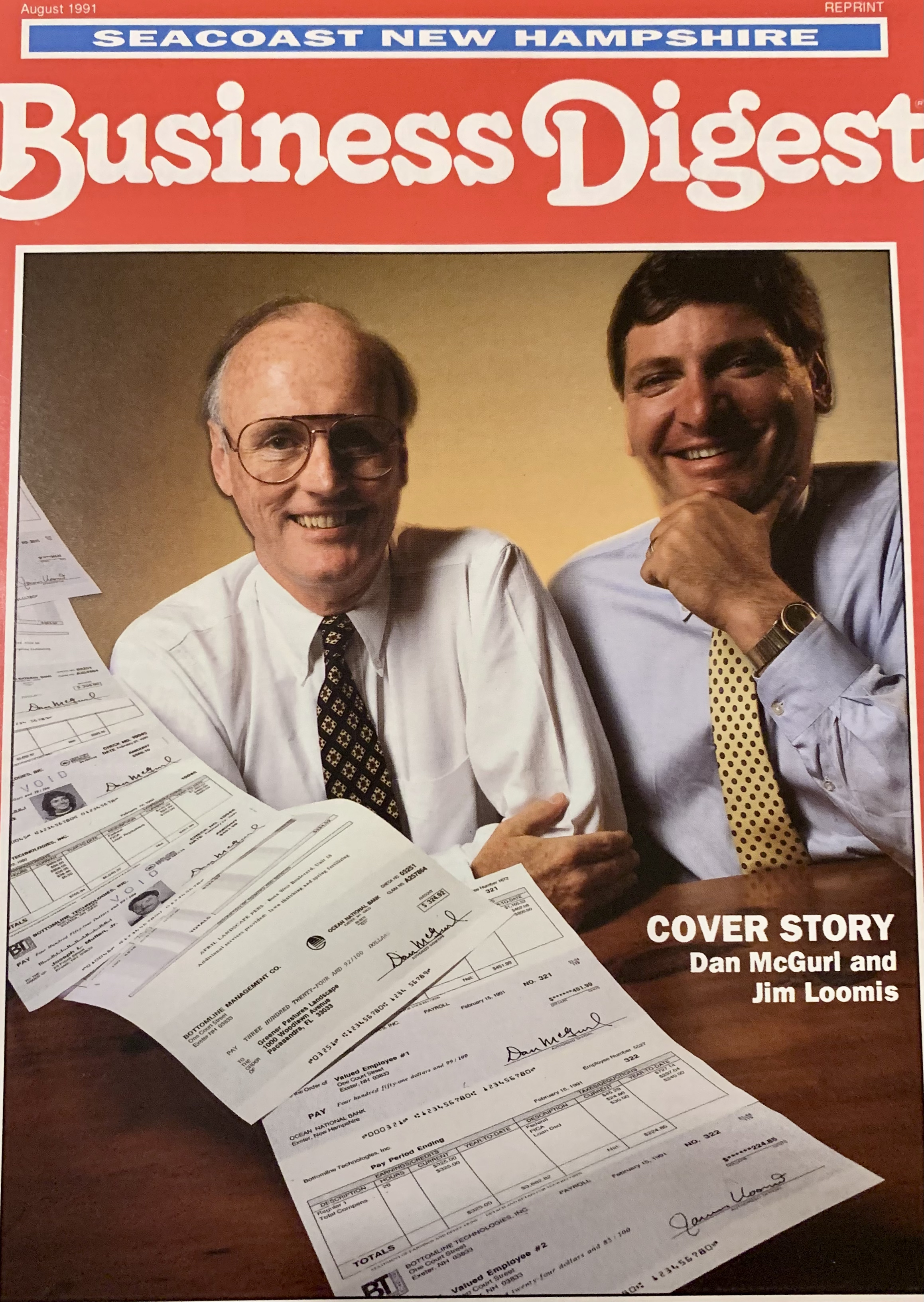 August 1991 Business Digest cover showing Dan McGurl, left, and Jim Loomis behind printed checks