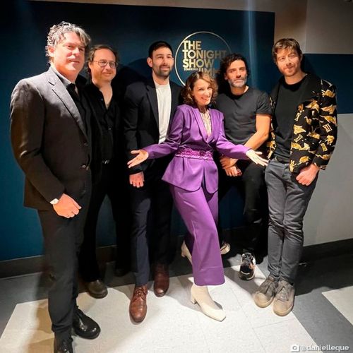 Gaby Moreno, Óscar Isaac, Jimmy Fallon and collaborators posing backstage at The Tonight Show
