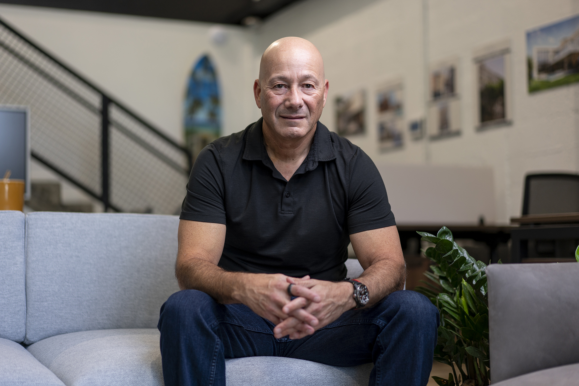 Danny Fishman seated in GAIA Real Estate’s Miami office