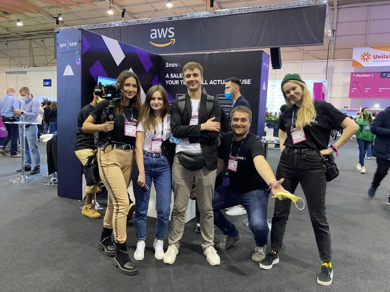 Members of the Snov.io team at a Web Summit exhibition stand in 2022
