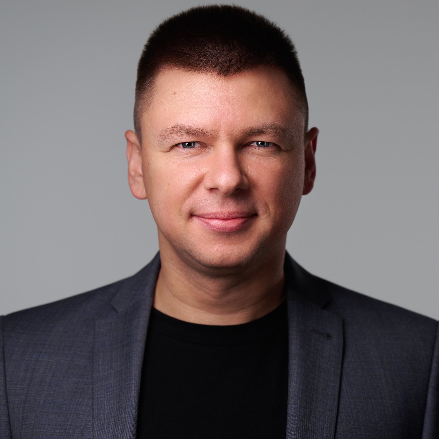Portrait of DashDevs founder and CEO Igor Tomych