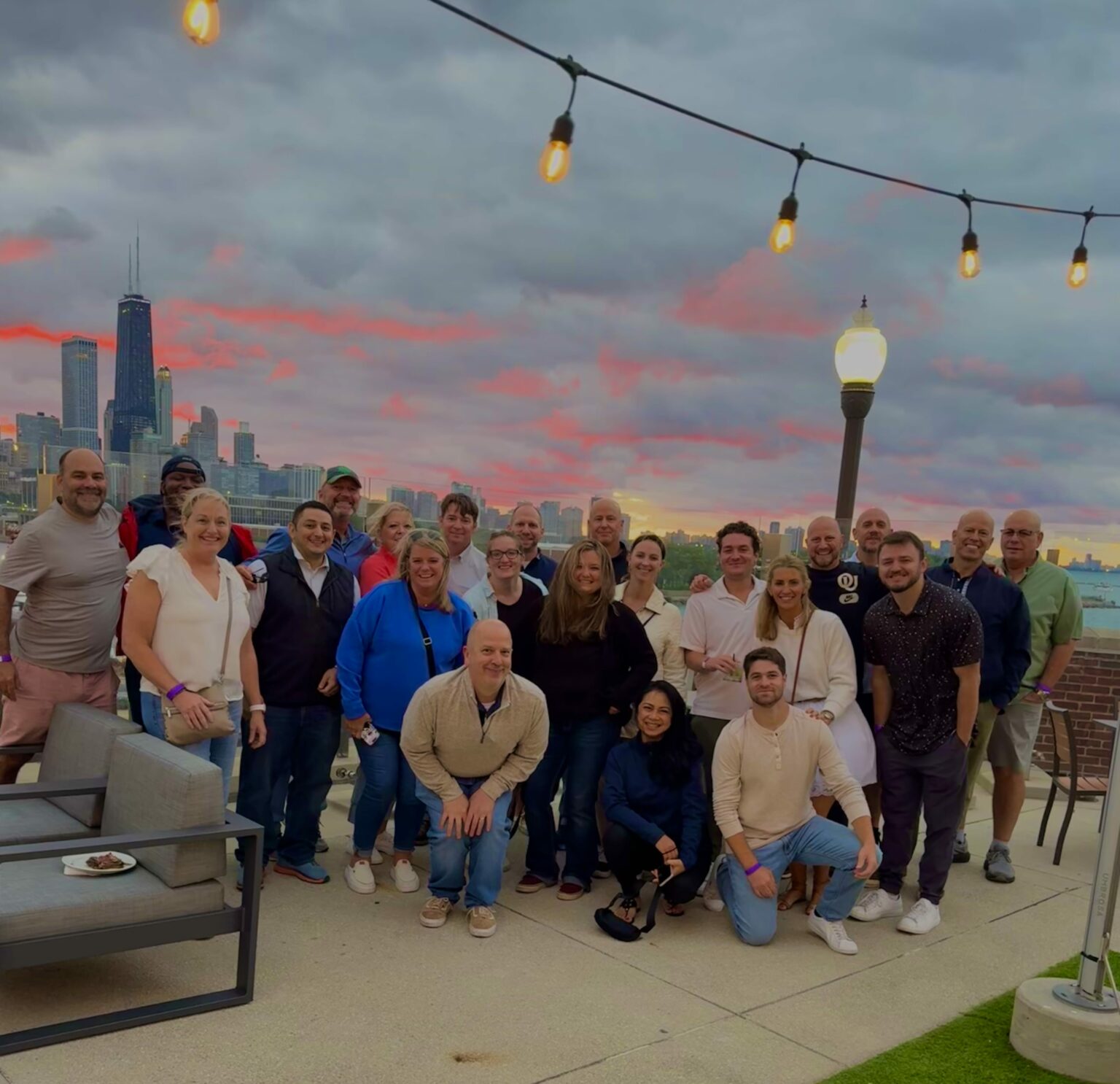 Data Innovations North America sales team gathered on a Chicago rooftop in 2025