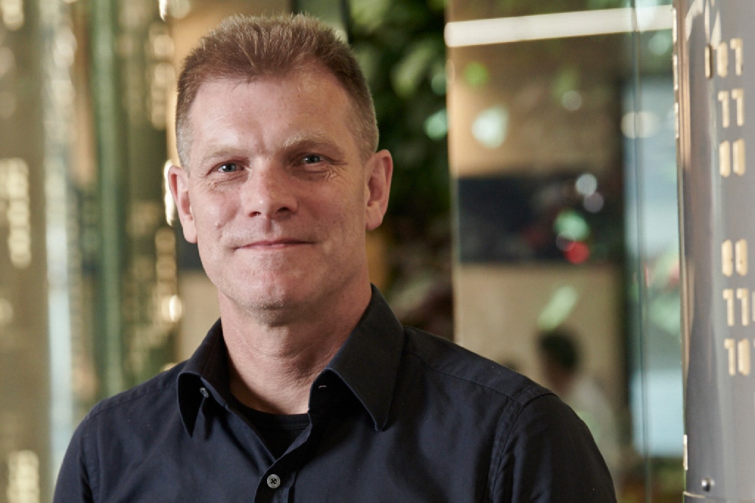 Datacom chief executive Greg Davidson smiling at the Tahi office