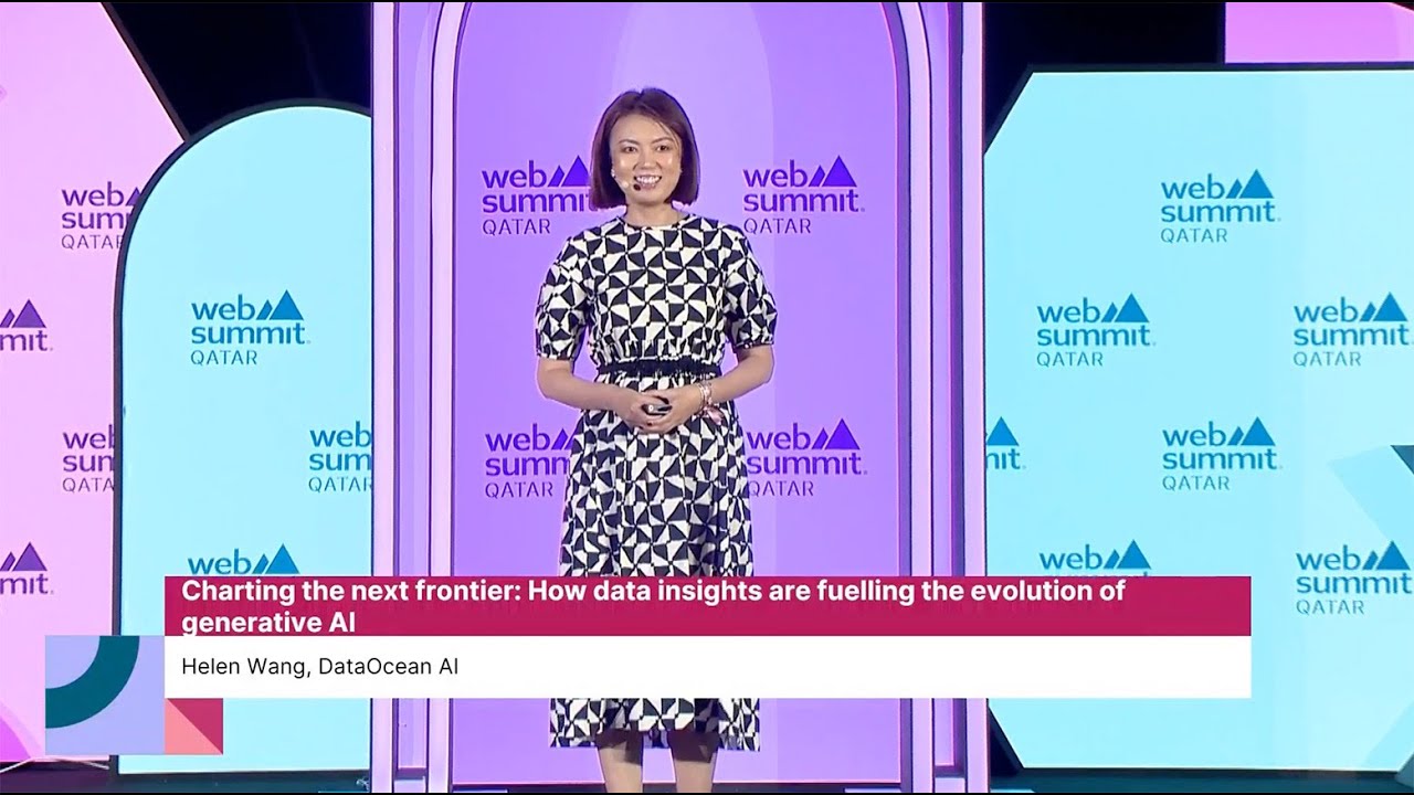 Dataocean AI CMO Helen Wang speaking on stage at Web Summit Qatar 2024