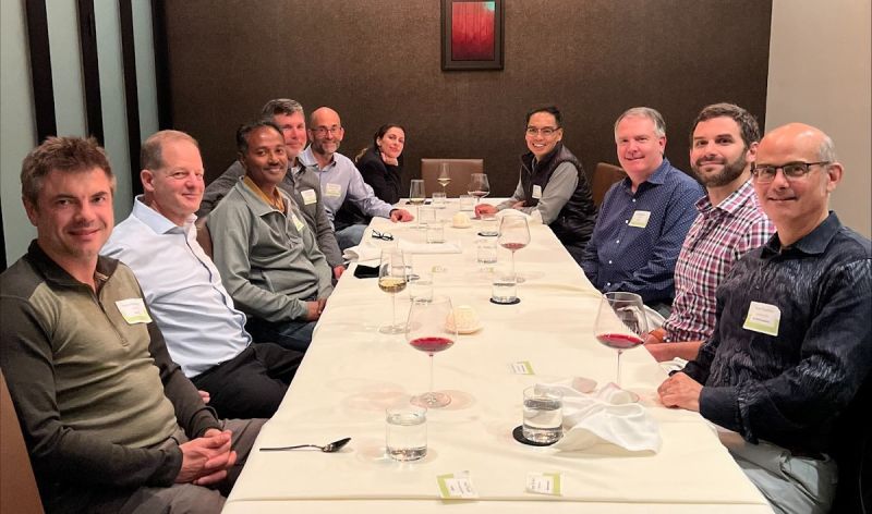 Participants seated around a restaurant table at a Dev.Pro CTO dinner in San Francisco