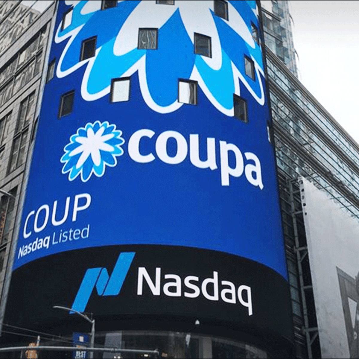 Coupa signage on the Nasdaq building