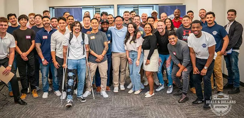 David Choi, at center, with participants in a Deals & Dollars weekend bootcamp