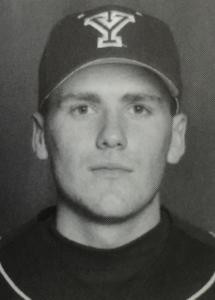 Archival black-and-white BYU baseball portrait of David Decker wearing a Y cap