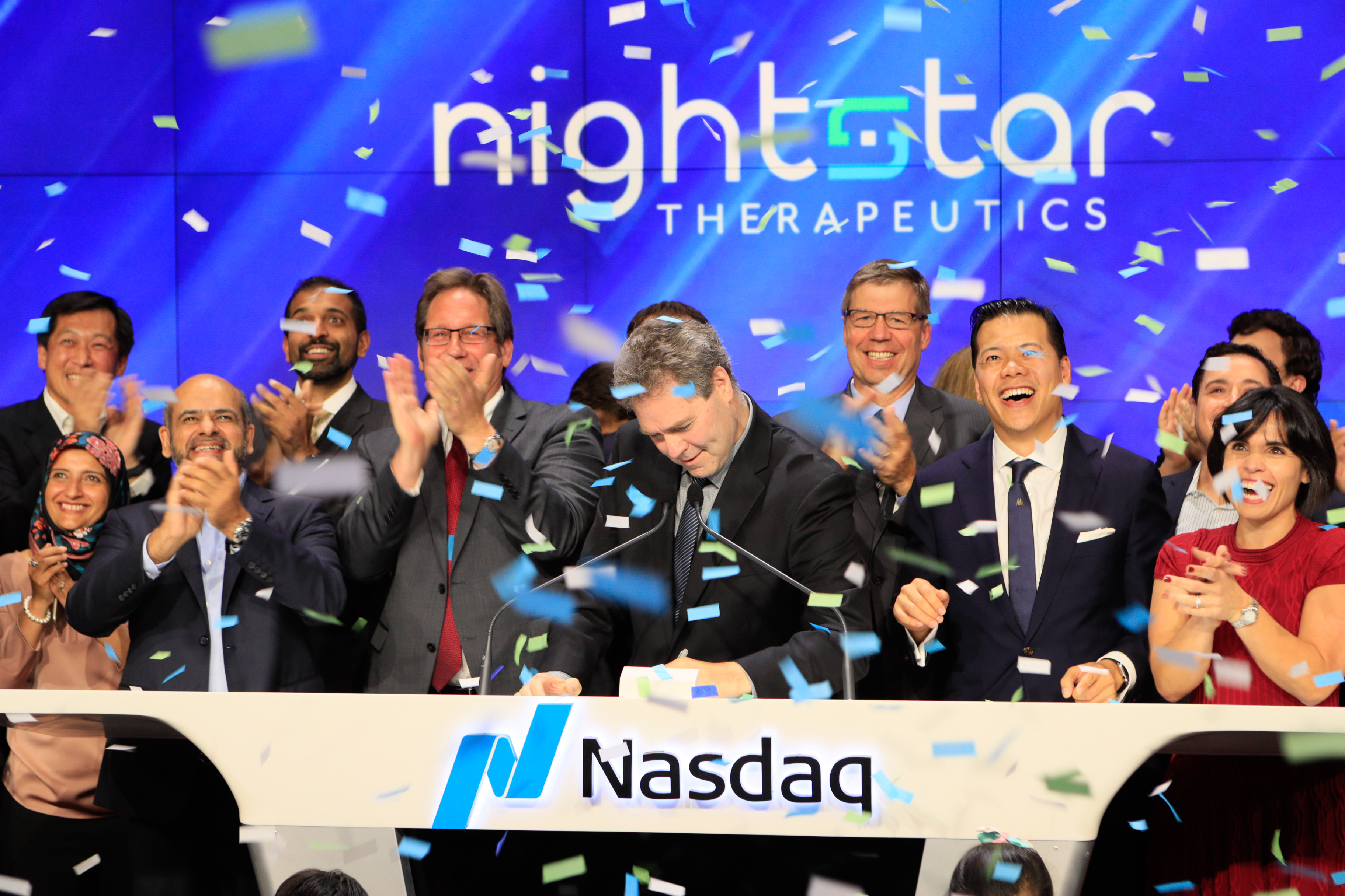 David Fellows at the center of the Nightstar group during the Nasdaq closing bell ceremony in September 2017